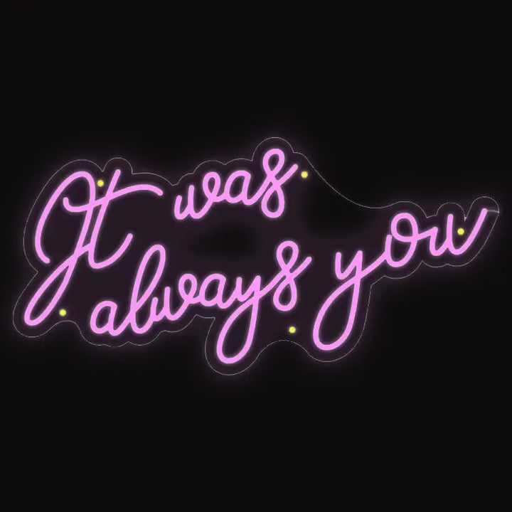 Romantic pink neon sign that reads It was always you